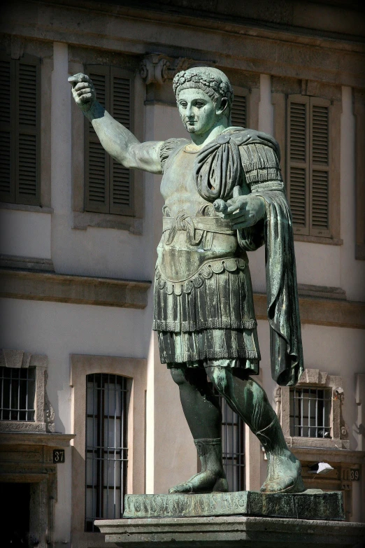 a statue of a man holding a gun is shown