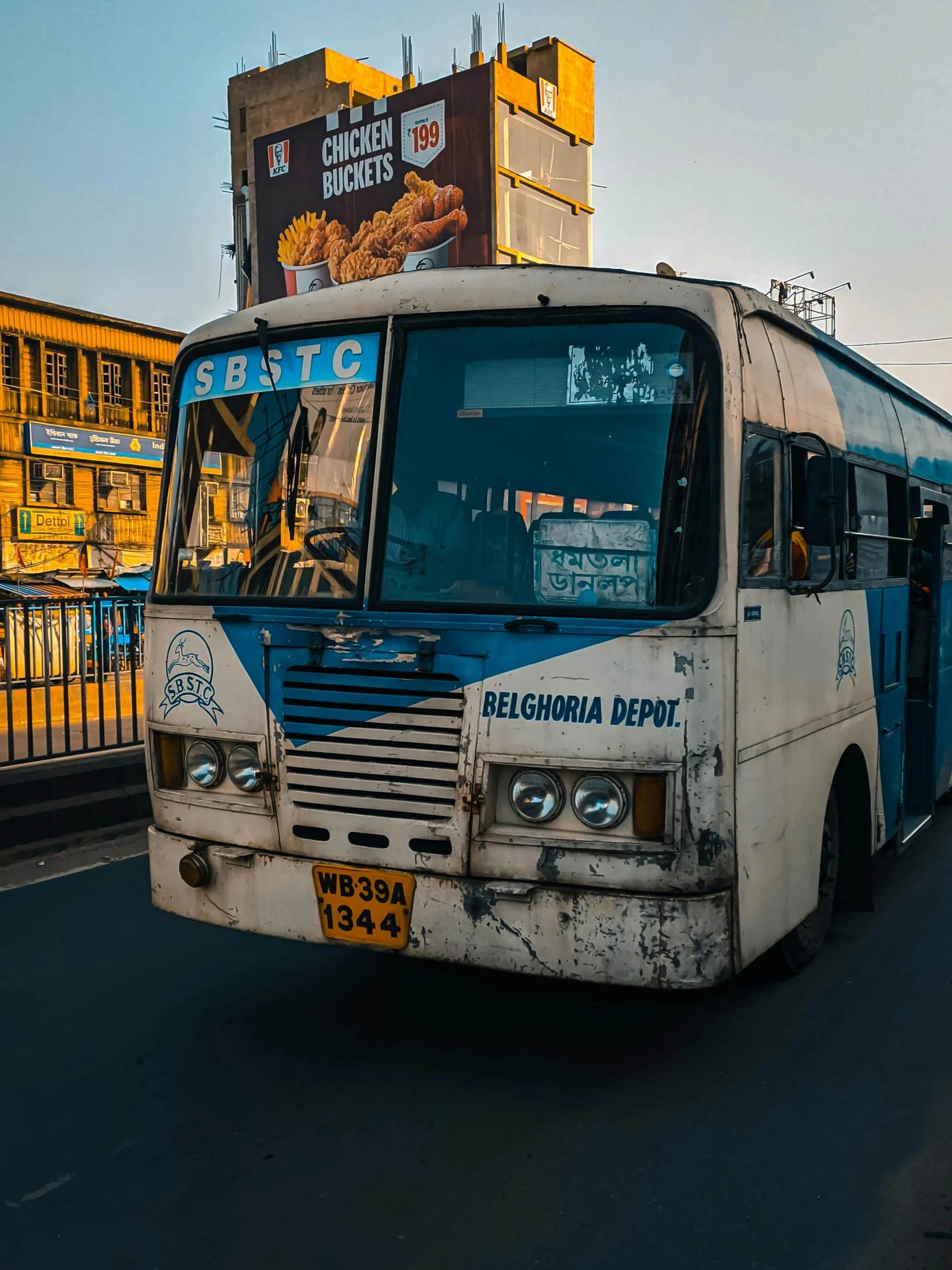 a large bus driving down the street with people