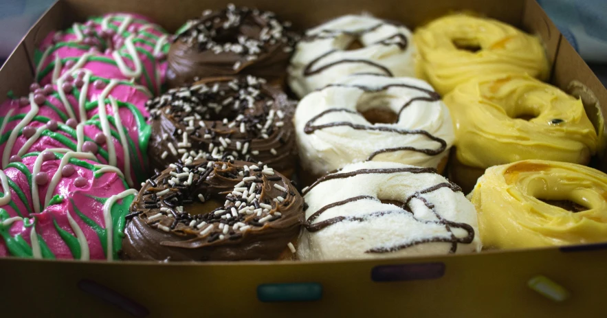 a box filled with a variety of doughnuts