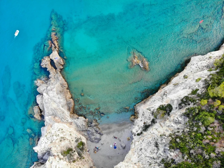 a aerial s of people swimming on blue water