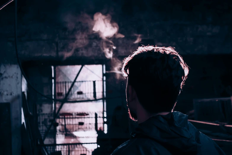 a person standing in an industrial setting