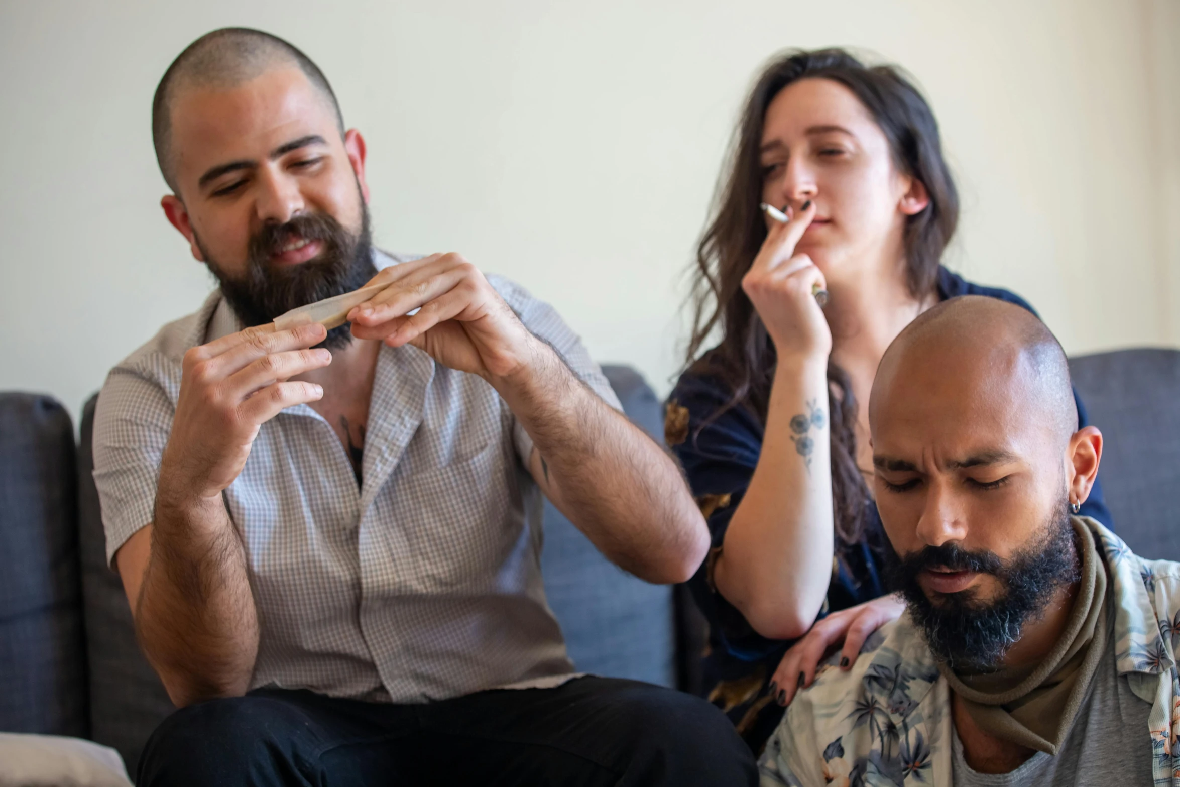 two people looking at soing while they look at their fingers