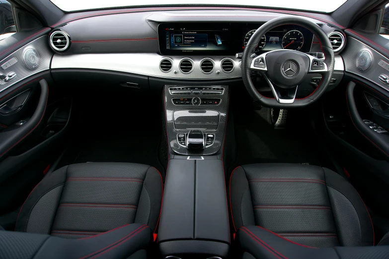 the interior of a mercedes coupe with the center console