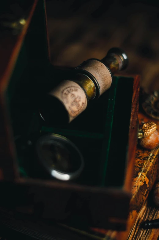 an empty wine bottle and some corks on a table