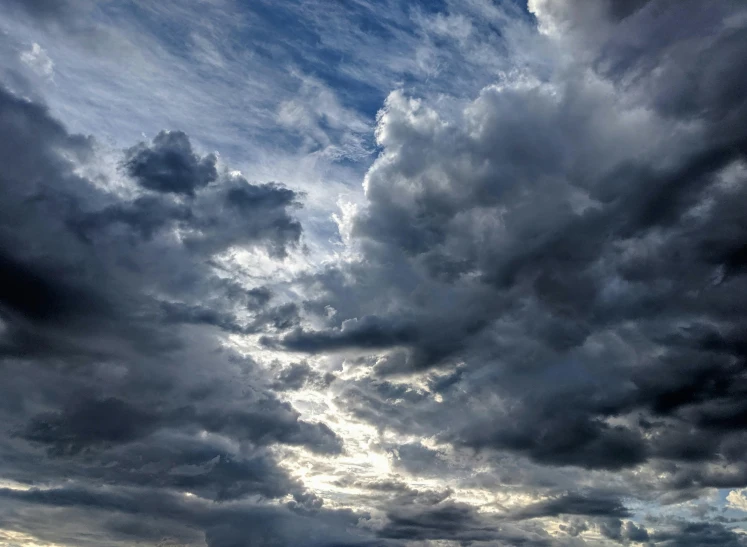 the sky is filled with dark clouds and it appears like storm