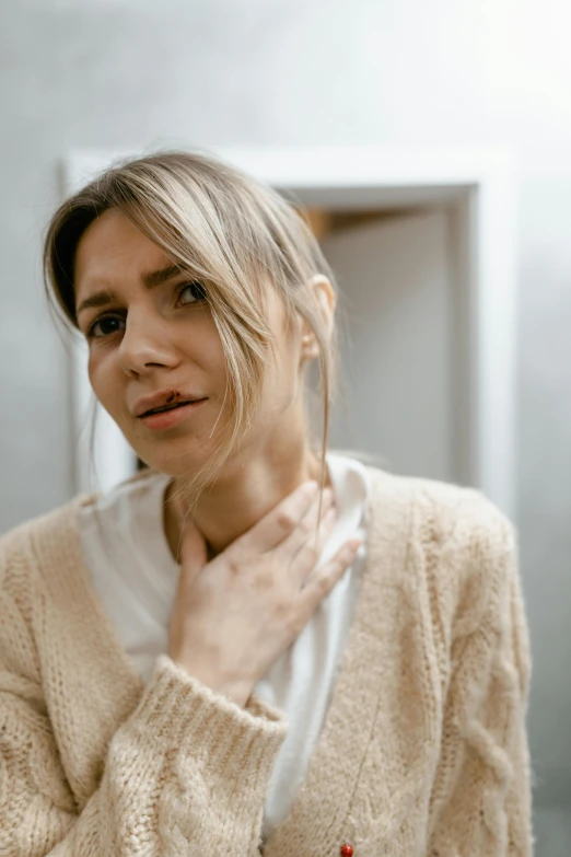 a woman posing for a pograph with a jacket on