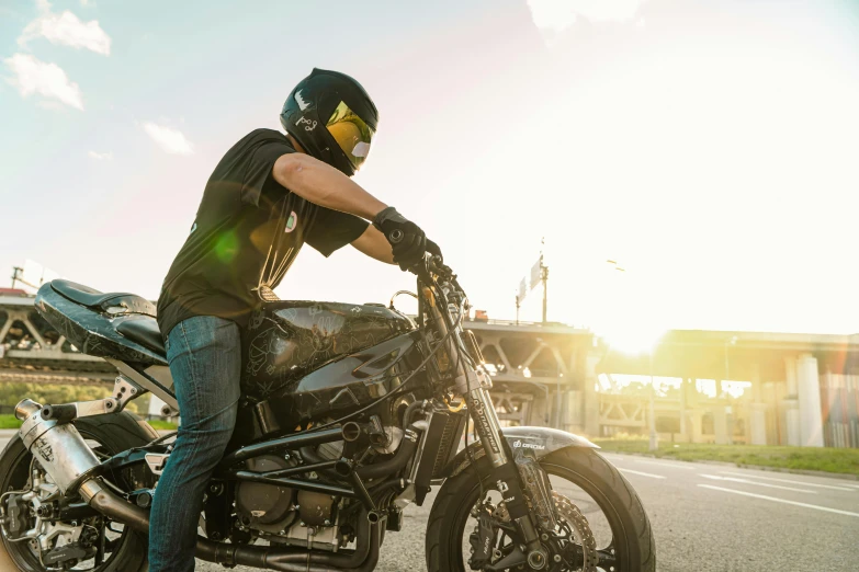 a person on a motorcycle wearing a helmet