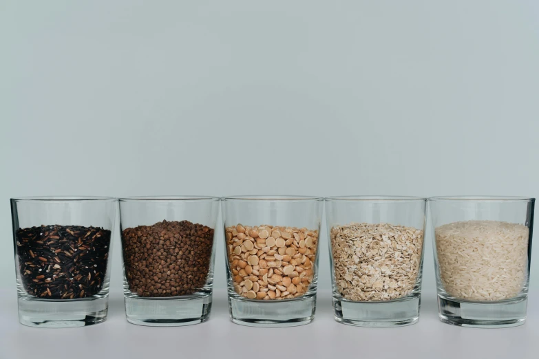 three s glasses filled with grain and oats