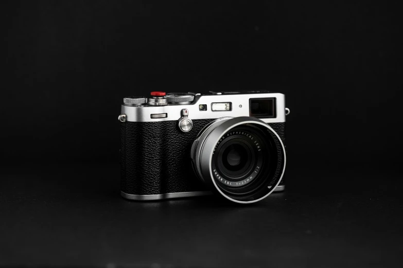 a black and white po of a camera with the lens removed