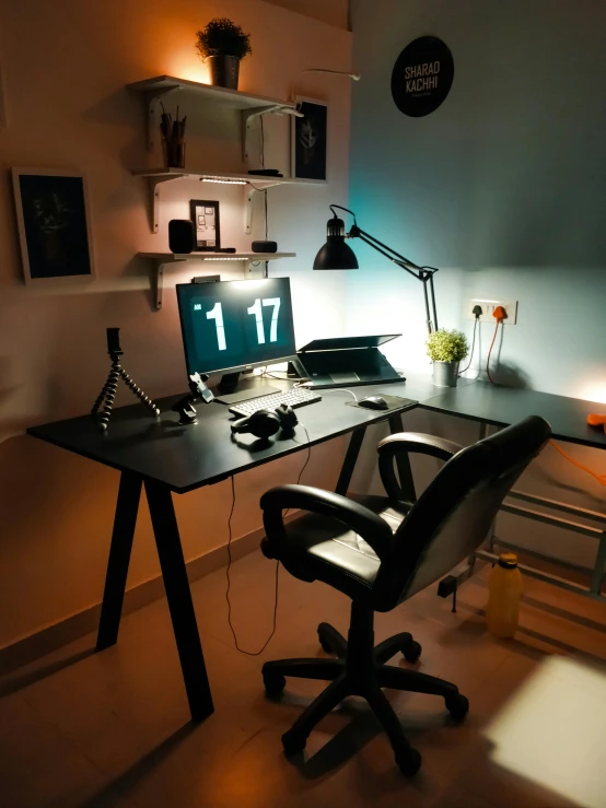 a dimly lit room with some desk chairs