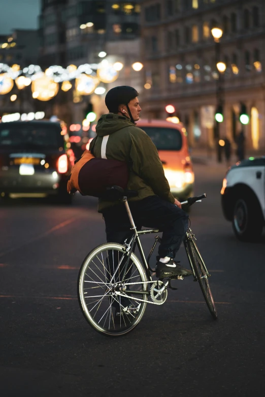 a person is riding a bicycle in the street