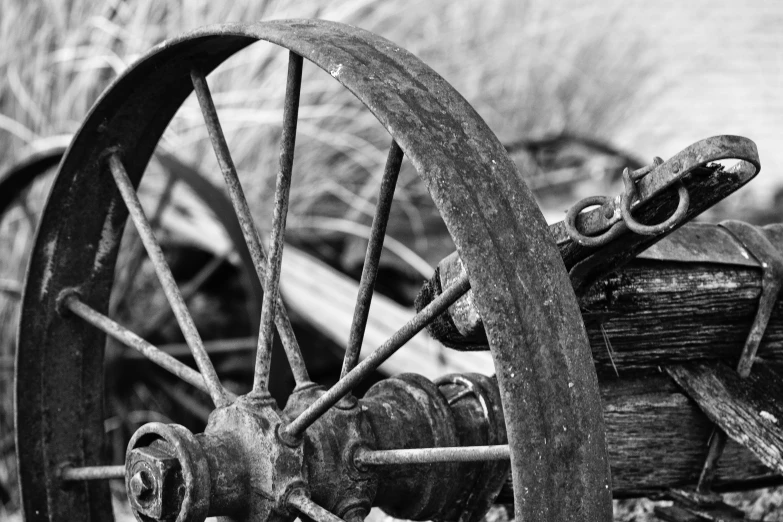 a close up of an old water powered wagon