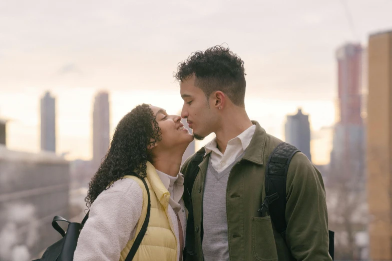 a man and woman that are standing together