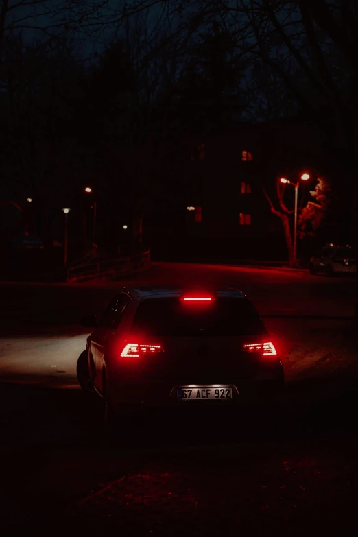 a car that is in the street at night
