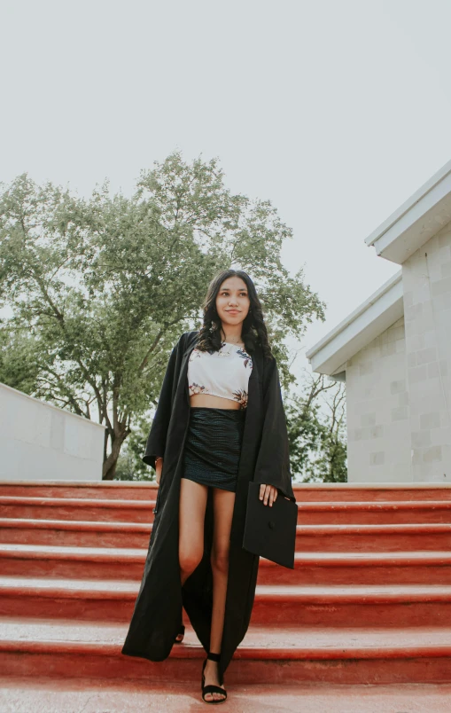 an image of a woman that is walking on the stairs