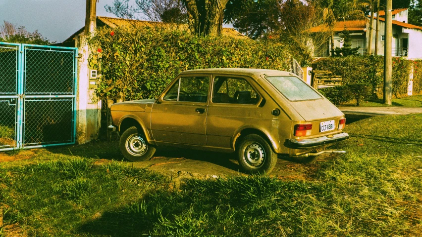 this is a car parked outside an old home