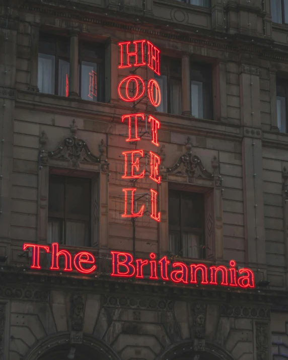 a neon sign reads, the britamina