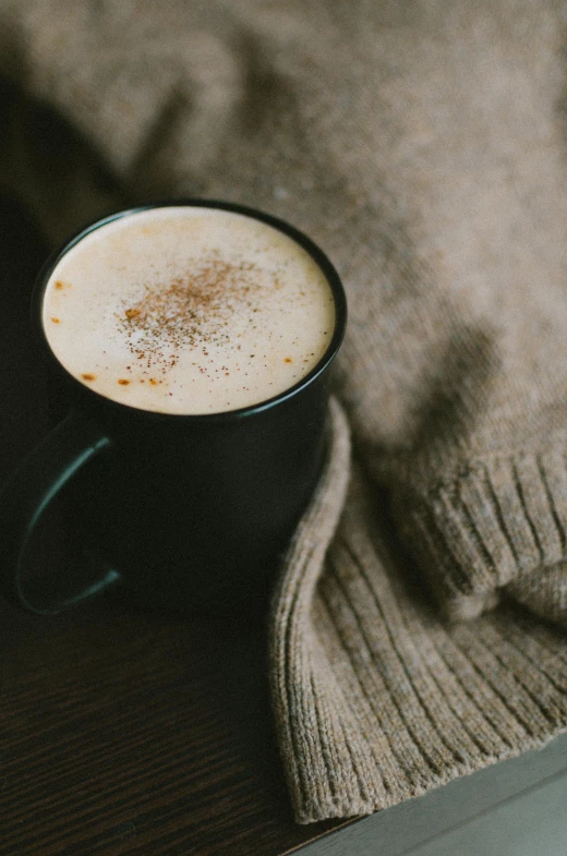 a mug with cinnamon sprinkles on it