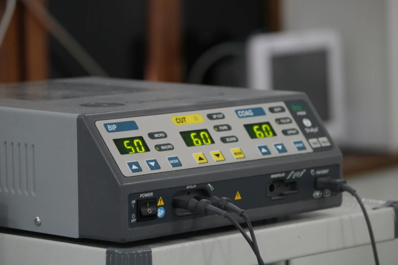 a laboratory equipment with multiple electronic devices on top