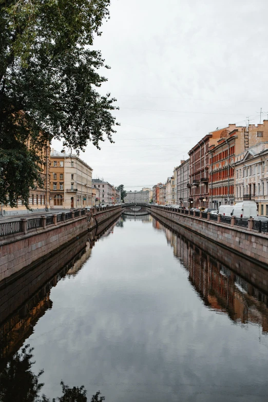 a waterway in a small town with many buildings