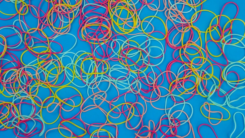 a blue background filled with red, white and yellow objects