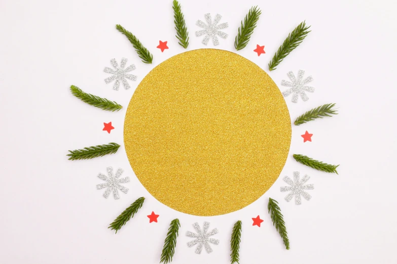 a christmas ornament on a white surface with star and snowflakes