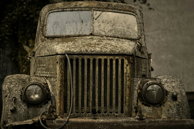 a close up of an old dirty truck