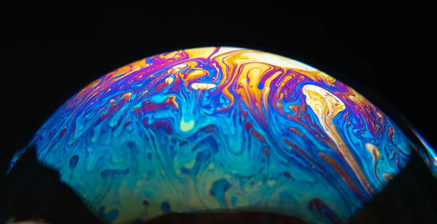 a closeup view of soing that looks like swirling paint