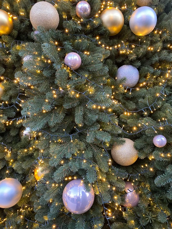 christmas tree decorated with ornaments and lights