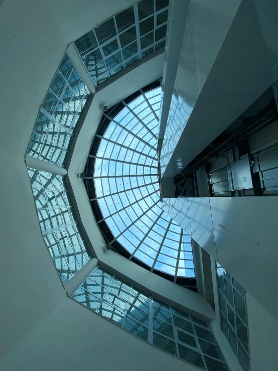 looking up at a skylight in an office building