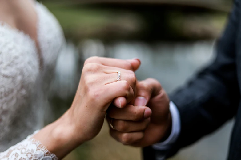 a closeup of a person holding their hand