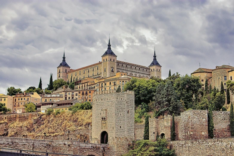 an old castle on top of a hill