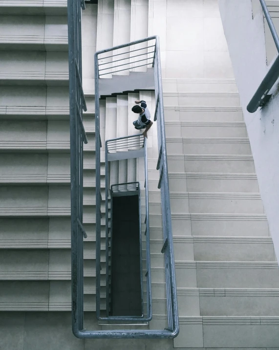 the aerial view of two stairs up to a building