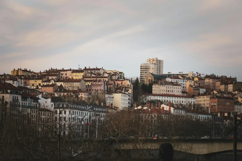 a view of some buildings in the middle of a town