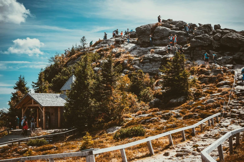 a view of a wooden building on top of a mountain