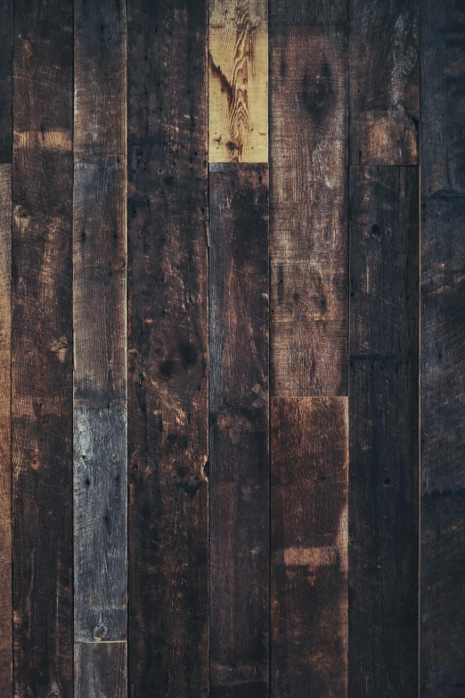 a close - up po of a brown wood floor