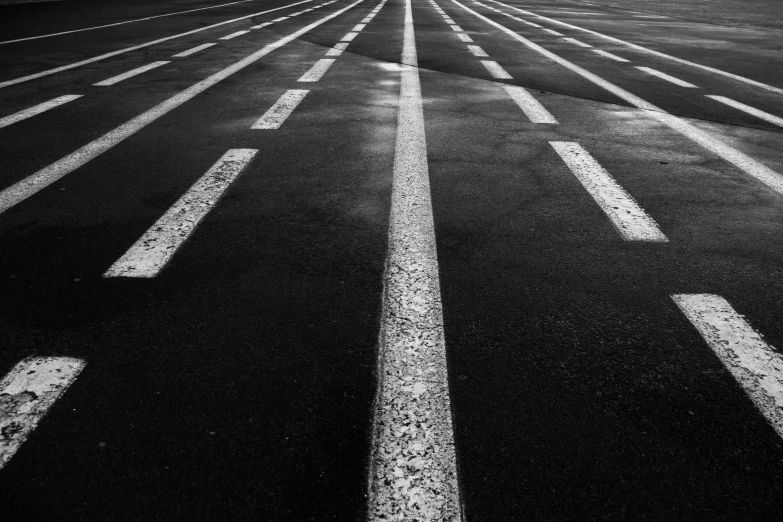 some lines painted on the pavement of a road