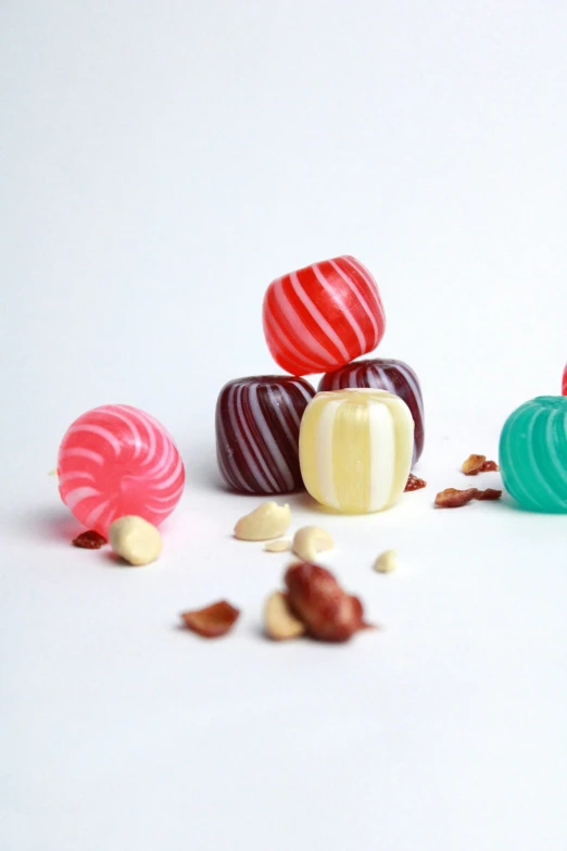 candy candies sit in different shapes, sizes and flavors