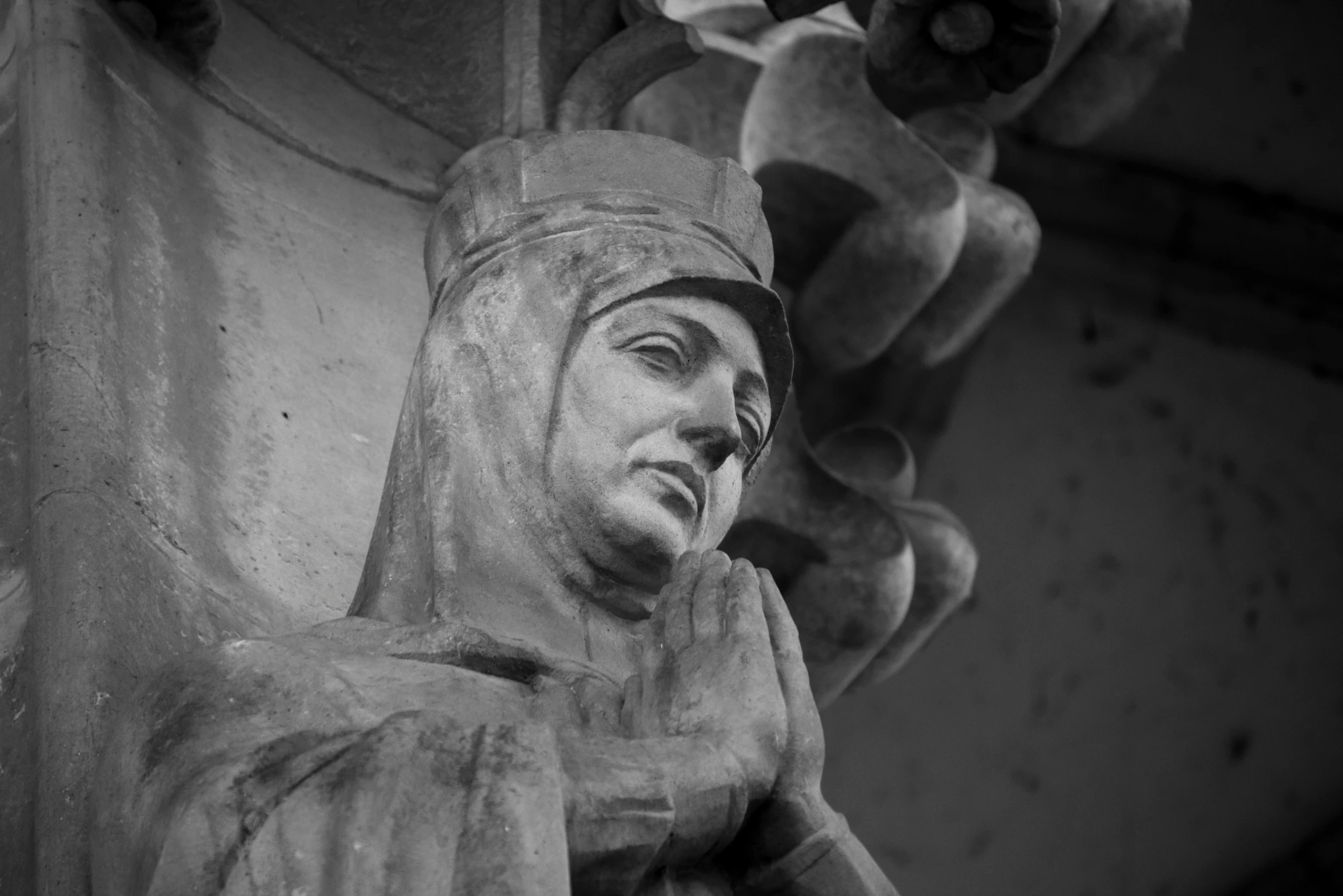 a black and white po shows a statue