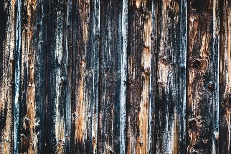 an old wood plank background with only vertical lines of color