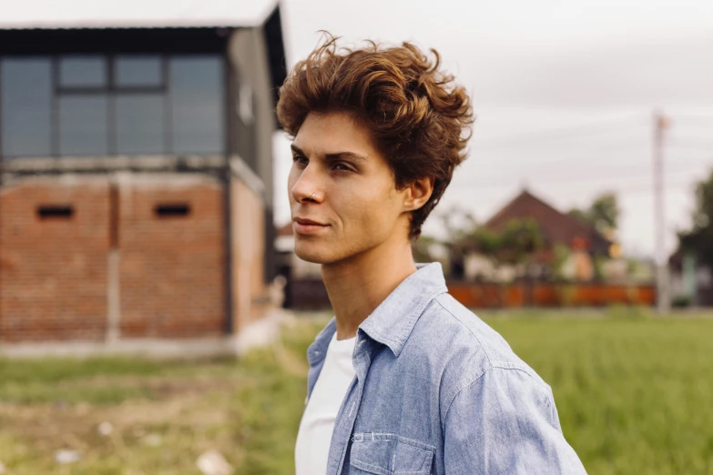 a man standing in front of a building