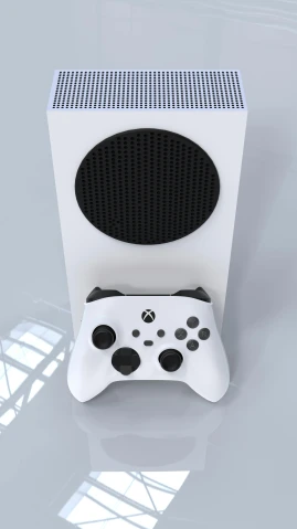 a wireless video game controller sitting on top of a desk