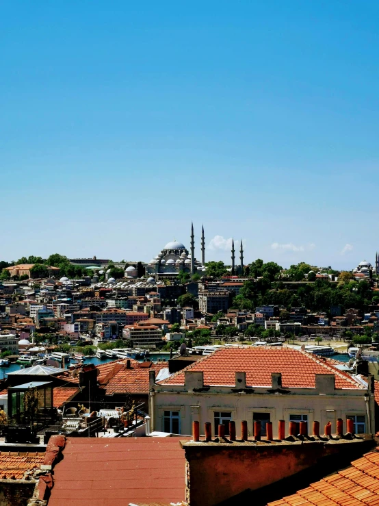 an elevated view of the city and hills