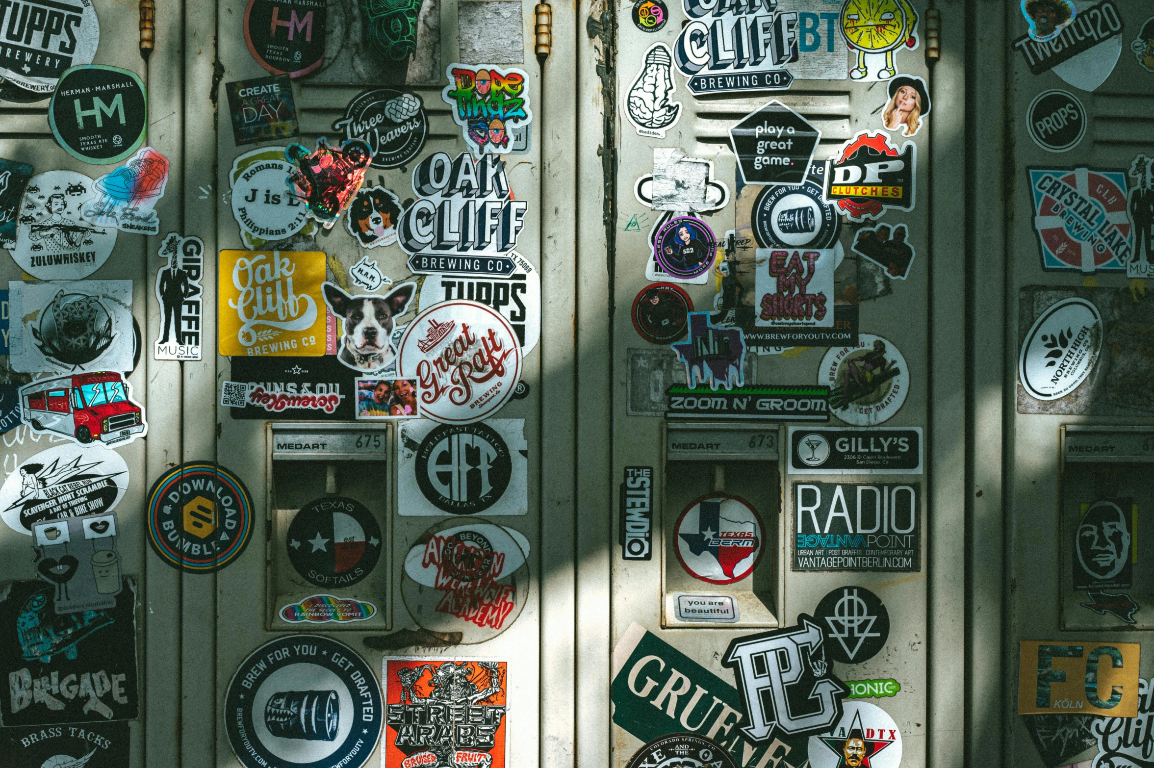 some badges that are on the side of a wall