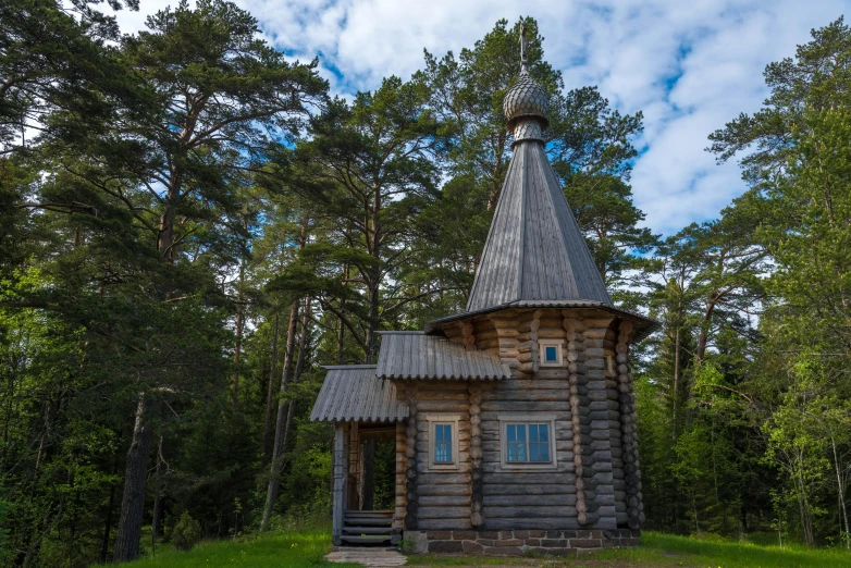 an old church built into the woods in the country