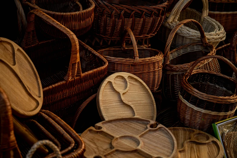 a large amount of woven baskets on display