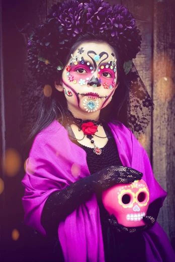 a woman dressed in pink and wearing face paint
