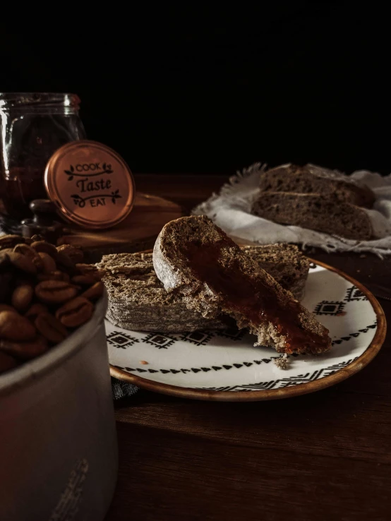 a variety of desserts are on plates and in a bucket