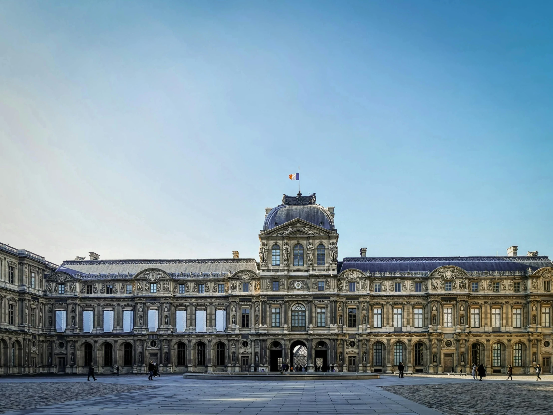 an old palace with a clock tower on top