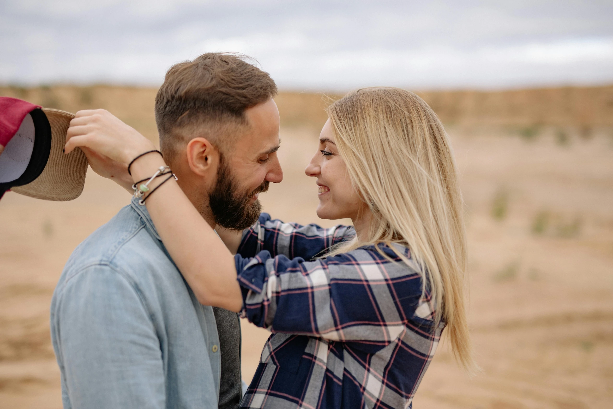 the man and woman are standing near each other